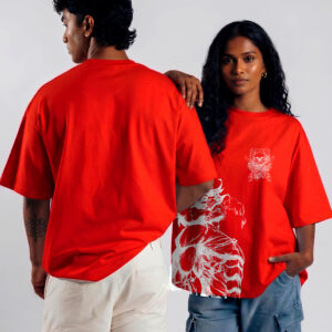 boy and girl wearing red attack on titan print t-shirt. boy is showing backside. Girl has her arm placed on the boy's shoulder.
